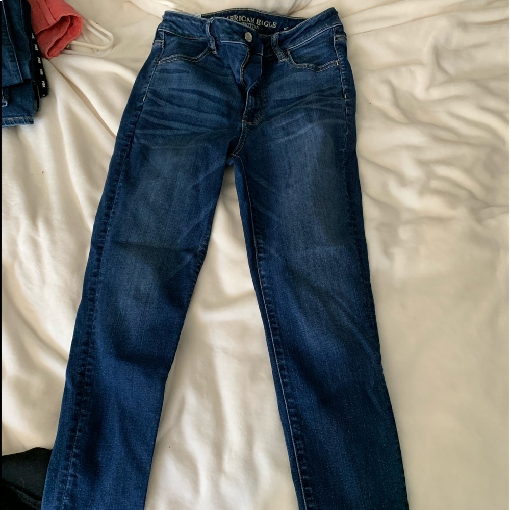 medium wash american eagle jeans.